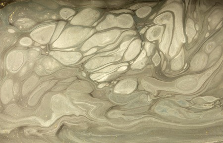 Gold marbling texture design. Beige and golden marble pattern. Fluid art