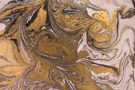Marble abstract acrylic background. Marbling artwork texture. Agate ripple pattern. Gold powder.の写真素材