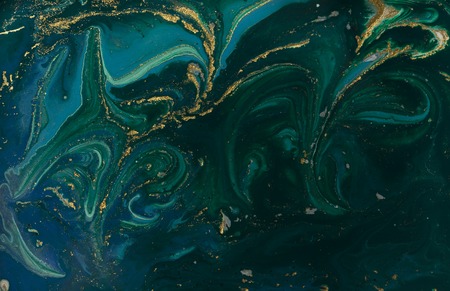 Green and blue marble abstract acrylic background. Marbling artwork texture. Agate ripple pattern. Gold powder.の写真素材