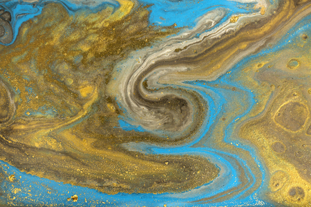 Gold marbling texture design. Blue and golden marble pattern. Fluid art.の写真素材