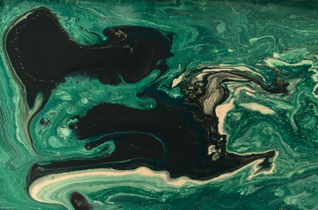 Gold marbling texture design. Blue and golden marble pattern. Fluid art.の写真素材