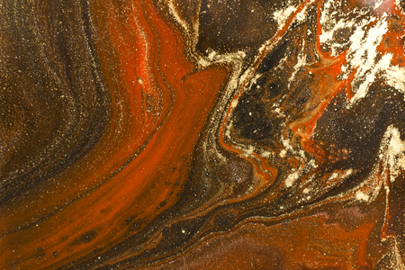 Gold marbling texture design. Red and golden marble pattern. Fluid art.の写真素材