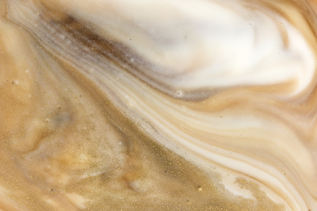 Beige marbling pattern. Golden marble liquid textureの写真素材