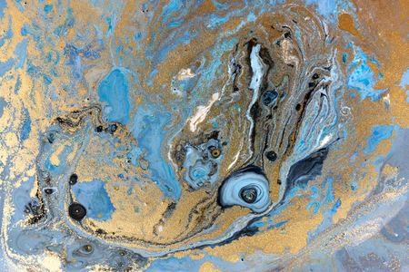 Blue marbling pattern. Golden marble liquid texture.の写真素材