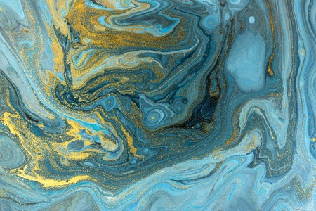 Blue marbling pattern. Golden marble liquid texture.の写真素材