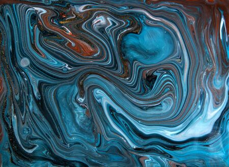 Blue and gold marbling pattern. Golden marble liquid texture.の写真素材