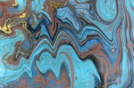 Blue and gold marbling pattern. Golden marble liquid textureの写真素材