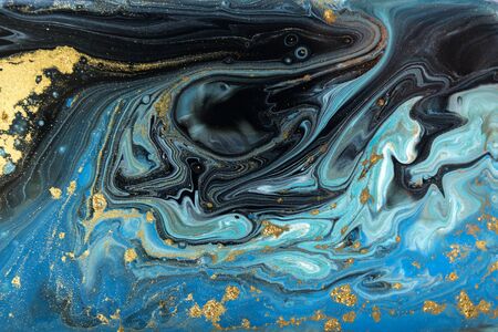 Blue and gold marbling pattern. Golden marble liquid textureの写真素材