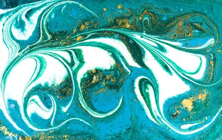 Liquid uneven blue and green marbling pattern with glare of light