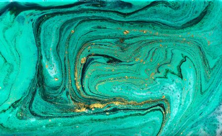 Green and gold marbling pattern. Golden powder marble liquid textureの写真素材