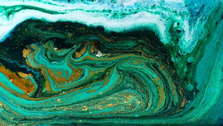Green and gold marbling pattern. Golden powder marble liquid textureの写真素材