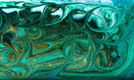 Green and gold marbling pattern. Golden powder marble liquid textureの写真素材