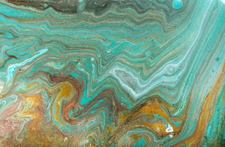 Bronze, blue and gold marble pattern. Golden marble liquid abstract background.