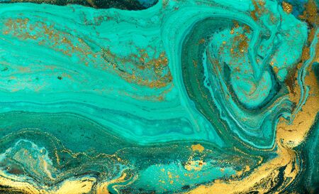 Liquid uneven blue and green marbling pattern with golden glitter and glare of light