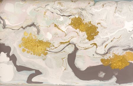 Pastel marble pattern with golden glitter. Abstract liquid background