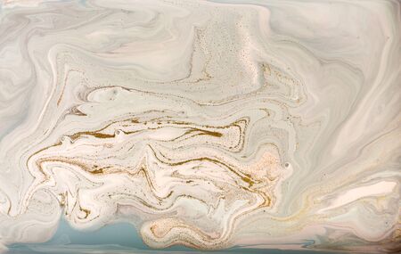 Pastel marble pattern with golden glitter. Abstract liquid background