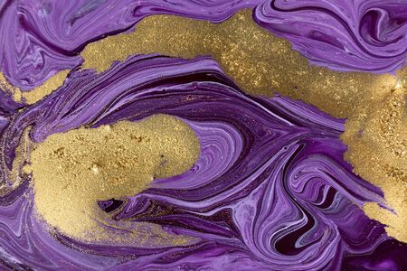 Violet mixed paint abstract background. Purple and gold marble patternの写真素材