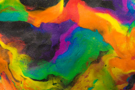 Colorful decorative rough plaster background. Close up wall grunge artwork texture.