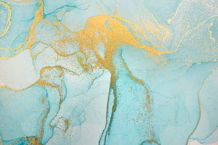 Alcohol ink blue and gold abstract background. Ocean style watercolor texture.の写真素材