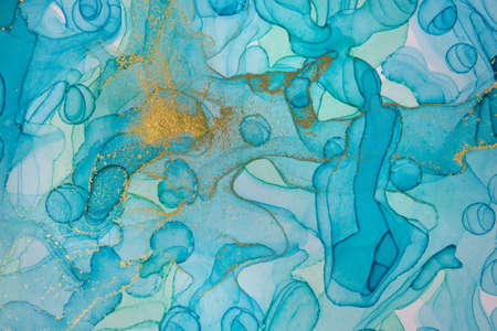 Alcohol ink blue and gold abstract background. Ocean style watercolor texture.