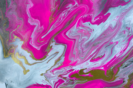 Pink, gold and white mixed inks spilled on white background. Golden glitter texture.の写真素材