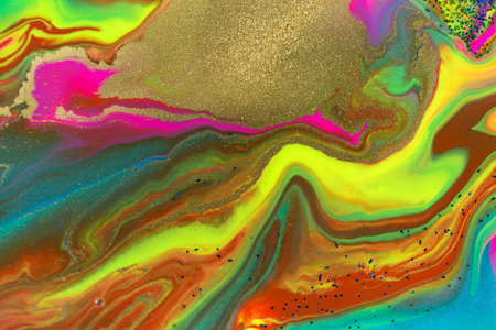 Neon colored marble pattern with gold, green and blue glitter. Fluorescent liquid background....