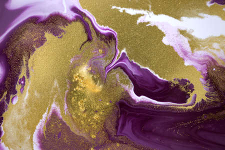 Marble purple acrylic texture with gold glitter. Close up liquid ink background.