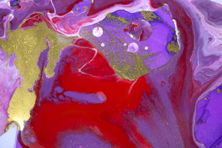 Marble crimson dark agate ripple background with gold powder.の写真素材