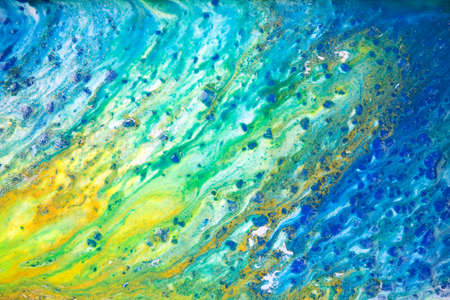 Marble blue and green abstract background in sea summer style. Liquid close up ink pattern.