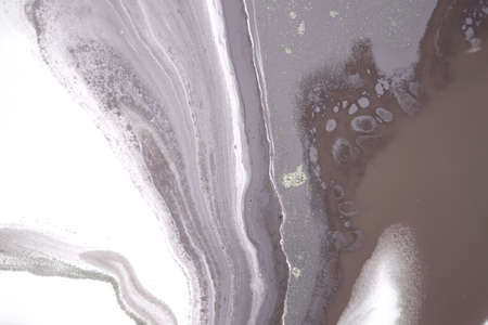 Beige and white marble texture. Liqued ink background.