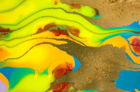 Gold glitter wave pattern. Fluorescent artwork liquid paint background.