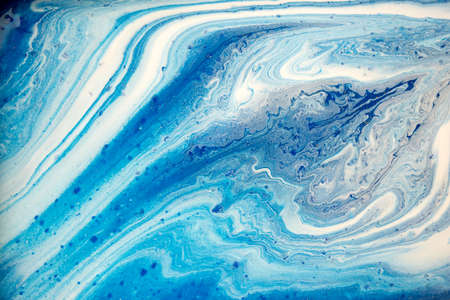 Marble blue and white abstract background. Liquid ink texture.