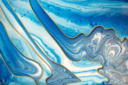 Marble blue and gold abstract wave background with gold gradient bordersの写真素材