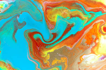 Abstract blue and red marble pattern with gold glitter. Liquid bright paint background.