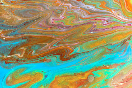 Abstract blue and red marble pattern with gold glitter. Liquid bright paint background.