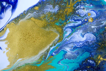Gold dust on liquid marble blue background. Stock illustration.