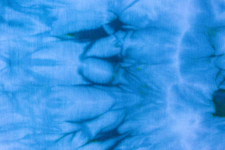 Close up tie dye fabric pattern. Hand made texture.の写真素材