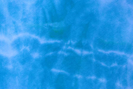 Close up tie dye fabric pattern. Hand made texture.