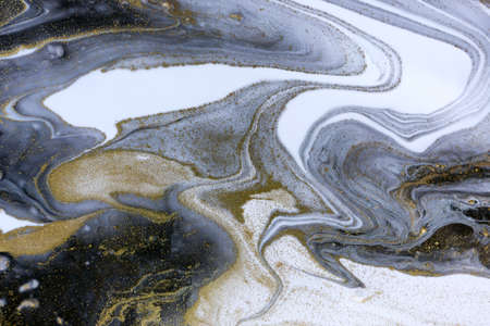 Marble abstract acrylic background with gold dust.の写真素材