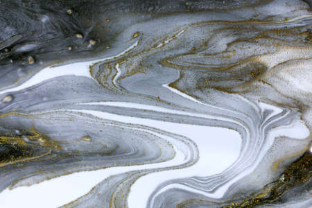 Marble gray abstract acrylic background with gold dust.の写真素材