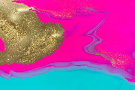 Gold yellow dust spots on flow vivid paints background. Abstract print