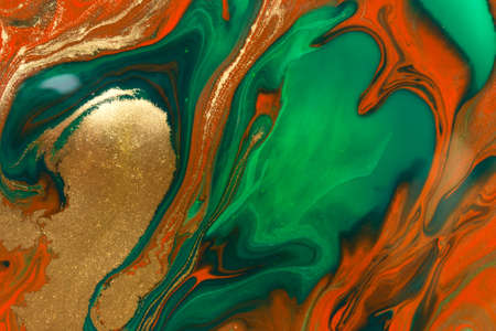 Christmas holiday gold, green and red background.の写真素材