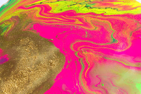 Gold spots on flow vivid paints background with bubbles. Abstract print