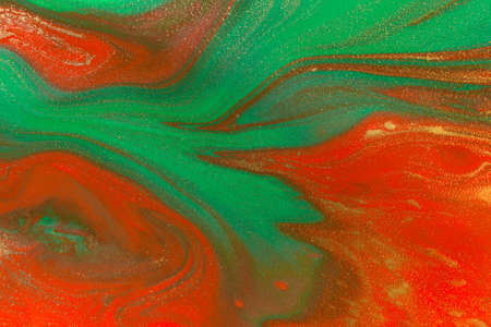 Christmas holiday gold, green and red background.の写真素材