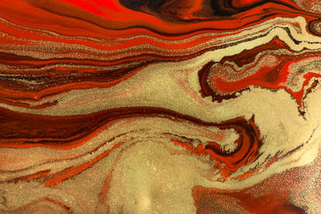 Gold waves on dark red background.