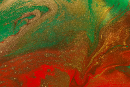 Gold waves on flow red and green paints abstract background.