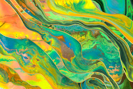 Gold dust and waves with fluorescent inks background. Ocean style marble template.