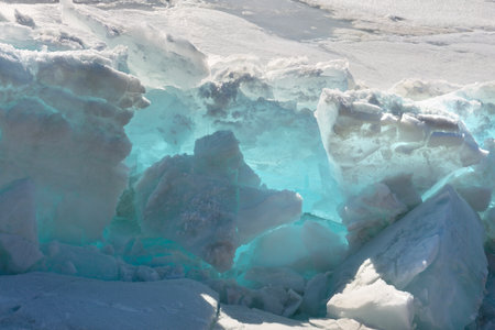 Blue Ice Clear Transparent Hummocks on the Frozen Lakeの写真素材