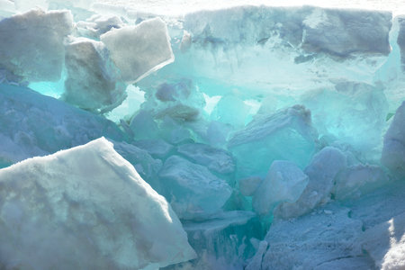 Blue Ice Clear Transparent Hummocks on the Frozen Lakeの写真素材