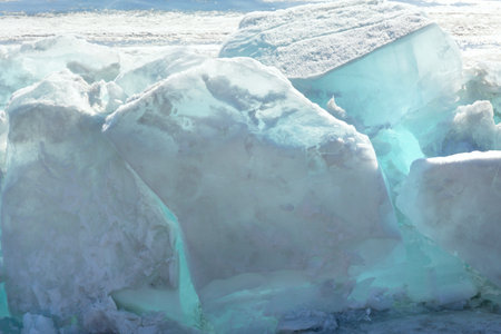 Blue Ice Clear Transparent Hummocks on the Frozen Lakeの写真素材